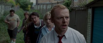 Movie still from “Shaun of the Dead” (2004), directed by Edgar Wright – Close Up shot, Over the shoulder angle