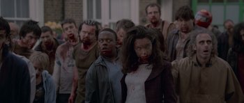 Movie still from “Shaun of the Dead” (2004), directed by Edgar Wright – Medium shot, Over the shoulder angle