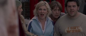 Movie still from “Shaun of the Dead” (2004), directed by Edgar Wright – Two women standing next to each other and one of the women has her mouth wide open; Close Up shot, Low angle