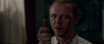 Movie still from “Shaun of the Dead” (2004), directed by Edgar Wright – Close Up shot, Over the shoulder angle