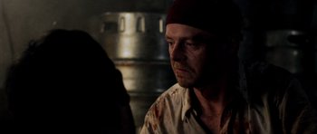 Movie still from “Shaun of the Dead” (2004), directed by Edgar Wright – A person wearing a hat; Close Up shot, Over the shoulder angle