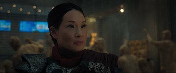 Movie still from “Shazam! Fury of the Gods” (2023), directed by David F. Sandberg – A person wearing a costume; Close Up shot, Over the shoulder angle