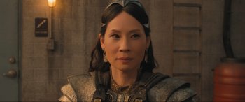 Movie still from “Shazam! Fury of the Gods” (2023), directed by David F. Sandberg – A person wearing a costume; Close Up shot, Over the shoulder angle