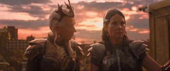 Movie still from “Shazam! Fury of the Gods” (2023), directed by David F. Sandberg – A couple of people standing next to each other on top of a hill; Medium shot, Over the shoulder angle