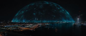 Movie still from “Shazam! Fury of the Gods” (2023), directed by David F. Sandberg – A city at night lit up by the lights; Extreme Wide shot, High angle