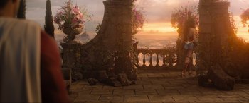 Movie still from “Shazam! Fury of the Gods” (2023), directed by David F. Sandberg – A view of a sunset from an outdoor setting; Extreme Wide shot, High angle