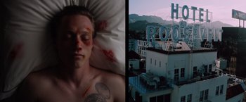 Movie still from “Shelter in Place” (2021), directed by Connor Martin – A man with blood all over his face and a building with a sign on it; Close Up shot, Overhead angle