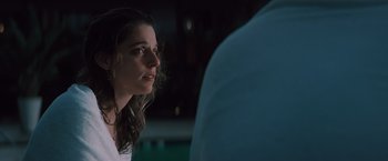 Movie still from “Shelter in Place” (2021), directed by Connor Martin – A person looking at something in the dark; Close Up shot, Over the shoulder angle