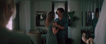 Movie still from “Shelter in Place” (2021), directed by Connor Martin – A man and a woman dancing in front of a mirror; Medium shot, Over the shoulder angle