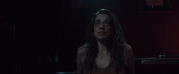 Movie still from “Shelter in Place” (2021), directed by Connor Martin – A woman with blood all over her face; Close Up shot, Low angle