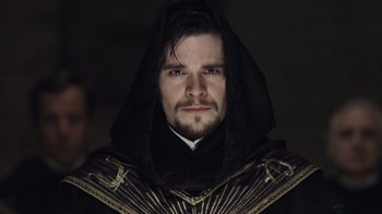 Movie still from “Sherlock Holmes” (2009), directed by Guy Ritchie – A person wearing a robe and a hood; Close Up shot, Low angle