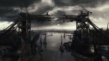 Movie still from “Sherlock Holmes” (2009), directed by Guy Ritchie – A bridge that has a bunch of boats in it; Extreme Wide shot, High angle