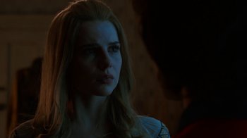 Movie still from “Bohemian Rhapsody” (2018), directed by Bryan Singer – A beautiful young woman with long blonde hair; Close Up shot, Over the shoulder angle