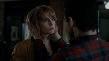 Movie still from “Bohemian Rhapsody” (2018), directed by Bryan Singer – A woman is looking at a man in the mirror; Close Up shot, Over the shoulder angle