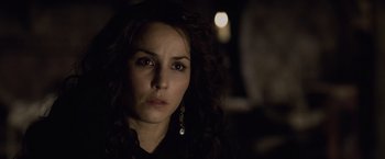 Movie still from “Sherlock Holmes: A Game of Shadows” (2011), directed by Guy Ritchie – A person wearing a black shirt; Close Up shot, Over the shoulder angle