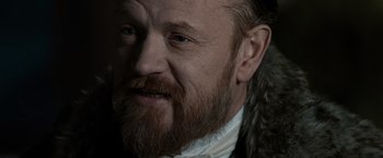 Movie still from “Sherlock Holmes: A Game of Shadows” (2011), directed by Guy Ritchie – A person with a beard; Close Up shot, Over the shoulder angle