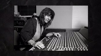 Movie still from “Sheryl” (2022), directed by Amy Scott – A woman sitting in front of a sound board; Close Up shot, Overhead angle