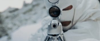 Movie still from “Shooter” (2007), directed by Antoine Fuqua – A person is holding a rifle and looking through a scope; Extreme Close Up shot, Over the shoulder angle