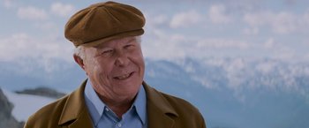 Movie still from “Shooter” (2007), directed by Antoine Fuqua – An older man wearing a brown hat and jacket; Close Up shot, Low angle