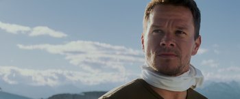 Movie still from “Shooter” (2007), directed by Antoine Fuqua – A person wearing a neck brace; Close Up shot, Low angle