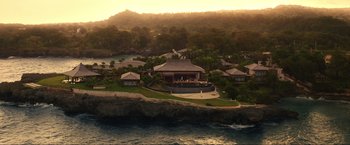 Movie still from “Shotgun Wedding” (2022), directed by Jason Moore – An aerial view of a resort with a pool; Extreme Wide shot, High angle