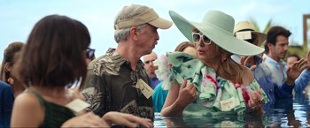 Movie still from “Shotgun Wedding” (2022), directed by Jason Moore – A man and a woman talking in the water; Medium shot, Over the shoulder angle
