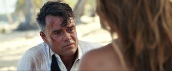 Movie still from “Shotgun Wedding” (2022), directed by Jason Moore – A person talking to another person; Close Up shot, Over the shoulder angle