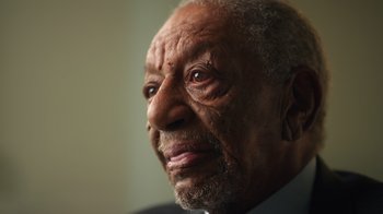 Movie still from “Sidney” (2022), directed by Reginald Hudlin – An old man with a beard and a mustache; Extreme Close Up shot, Low angle