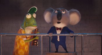 Movie still from “Sing 2” (2021), directed by Christophe Lourdelet – Two cartoon characters standing next to each other; Medium shot, Low angle