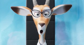 Movie still from “Sing 2” (2021), directed by Christophe Lourdelet – An animated goat wearing glasses and a tie; Close Up shot, High angle