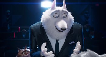 Movie still from “Sing 2” (2021), directed by Christophe Lourdelet – A man in a suit with a dog head on his shoulders; Medium shot, Over the shoulder angle