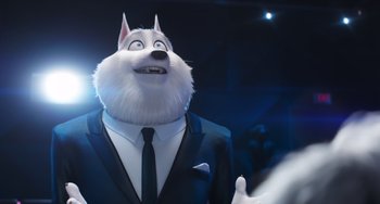 Movie still from “Sing 2” (2021), directed by Christophe Lourdelet – A man in a suit and tie with a dog face; Close Up shot, Over the shoulder angle