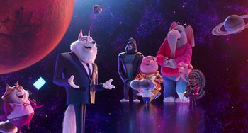 Movie still from “Sing 2” (2021), directed by Christophe Lourdelet – A group of cartoon characters standing next to each other in front of a space background; Wide shot, High angle