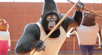 Movie still from “Sing 2” (2021), directed by Christophe Lourdelet – A monkey that is holding a bow and arrow; Medium shot, Low angle