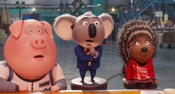 Movie still from “Sing 2” (2021), directed by Christophe Lourdelet – A group of cartoon figurines sitting next to each other; Medium shot, Low angle
