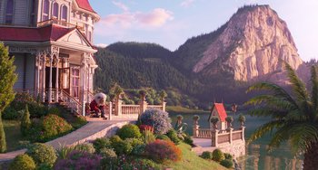 Movie still from “Sing 2” (2021), directed by Christophe Lourdelet – An image of a house with a lake in the background; Extreme Wide shot, Low angle