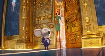 Movie still from “Sing 2” (2021), directed by Christophe Lourdelet – A mouse standing in front of a door next to a woman; Wide shot, Low angle