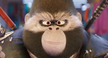 Movie still from “Sing 2” (2021), directed by Christophe Lourdelet – The face of a stuffed monkey; Extreme Close Up shot, Low angle