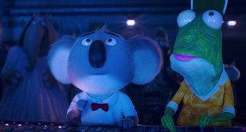 Movie still from “Sing 2” (2021), directed by Christophe Lourdelet – A stuffed animal on top of a table; Medium shot, Low angle