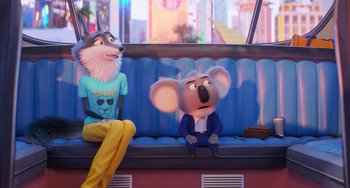 Movie still from “Sing 2” (2021), directed by Christophe Lourdelet – A couple of animals sitting next to each other on top of a bench; Medium shot, Over the shoulder angle