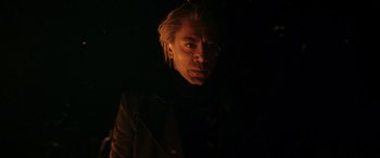 Movie still from “Skyfall” (2012), directed by Sam Mendes – A man with blonde hair wearing a black jacket; Close Up shot, Low angle