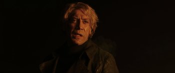 Movie still from “Skyfall” (2012), directed by Sam Mendes – A person wearing a jacket; Close Up shot, Low angle