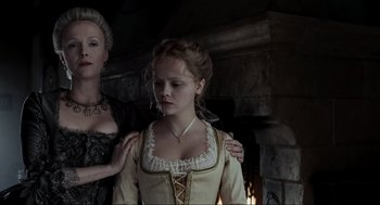 Movie still from “Sleepy Hollow” (1999), directed by Tim Burton – A woman and a girl in medieval clothing; Medium shot, Low angle