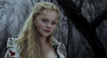 Movie still from “Sleepy Hollow” (1999), directed by Tim Burton – A young woman with long blonde hair and a white dress; Close Up shot, Low angle