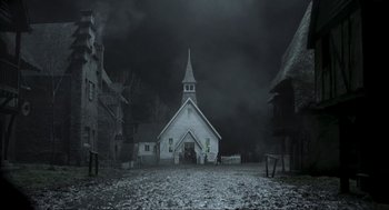 Movie still from “Sleepy Hollow” (1999), directed by Tim Burton – An old church with a steeple is in the middle of the night; Extreme Wide shot, Low angle