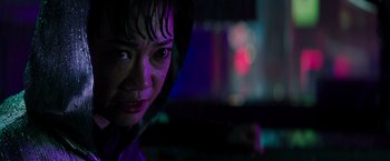 Movie still from “Snake Eyes” (2021), directed by Robert Schwentke – A person wearing a hoodie; Close Up shot, Low angle