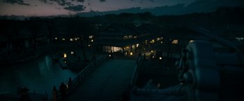 Movie still from “Snake Eyes” (2021), directed by Robert Schwentke – A night view of a bridge and a building; Extreme Wide shot, High angle
