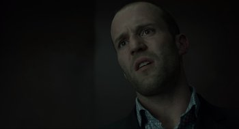 Movie still from “Snatch” (2000), directed by Guy Ritchie – A person with a beard; Close Up shot, Low angle