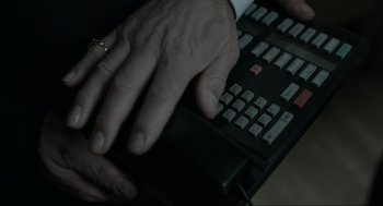 Movie still from “Snatch” (2000), directed by Guy Ritchie – A man's hand on a black keyboard; Extreme Close Up shot, High angle