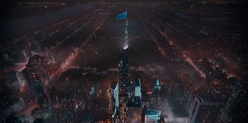 Movie still from “Sneakerella” (2022), directed by Elizabeth Allen Rosenbaum – An aerial view of a large city at night time; Extreme Wide shot, High angle